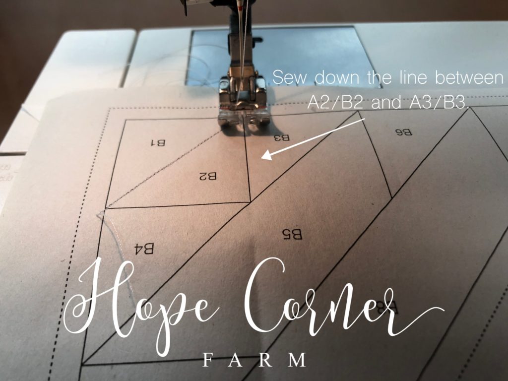 Sewing a seam in paper piecing Hope Corner Farm
