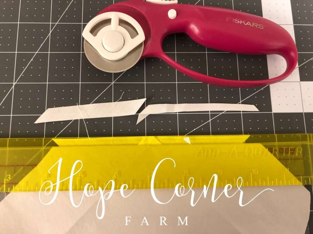 The trimmed fabric in paper piecing Hope Corner Farm