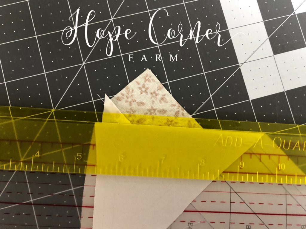 Preparing to trim the fabric in paper piecing Hope Corner Farm