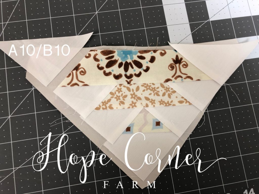 Adding the final fabric piece in paper piecing Hope Corner Farm