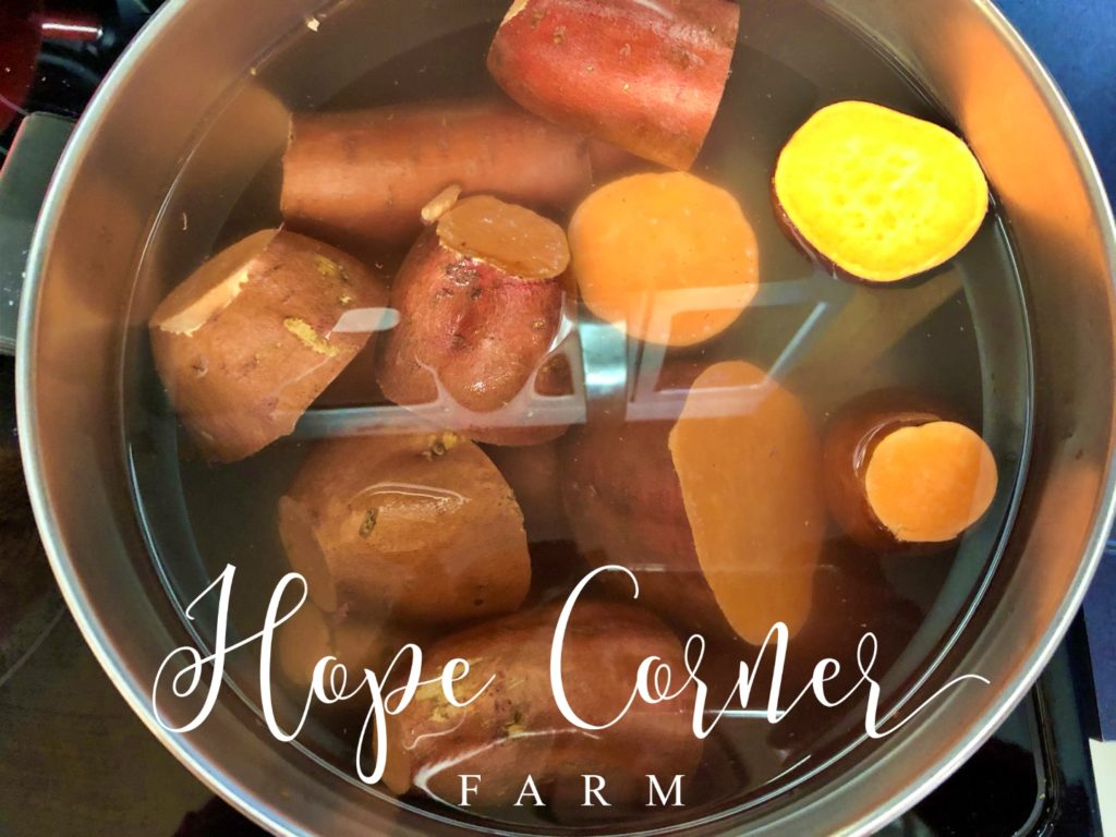 Boiling the sweet potatoes/yams Hope Corner Farm