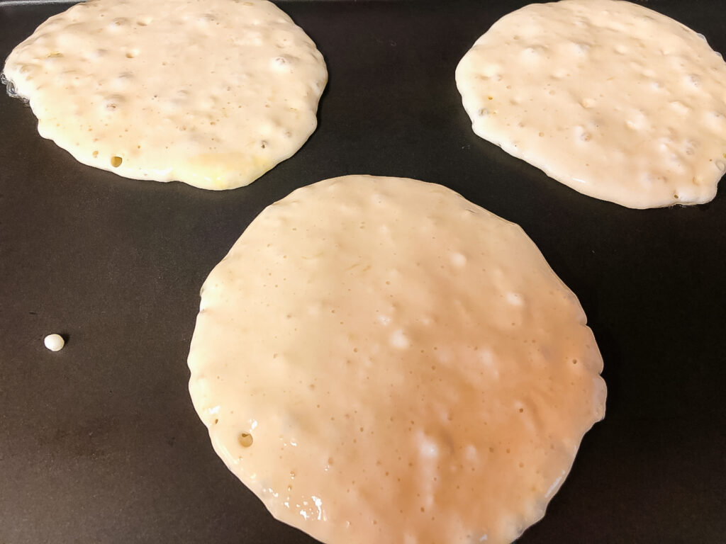 Cooking the quick and easy sourdough pancakes