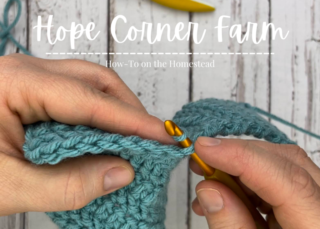 Pulling up a yarn for the second side of the crochet ear warmer