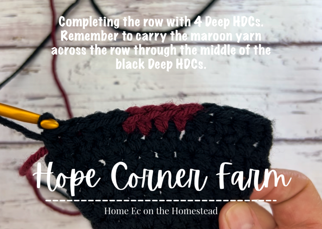 Finish the row of crochet by placing one deep HDC in black to the end of the row