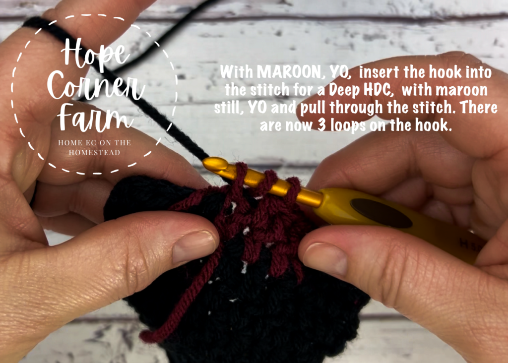 changing back to black yarn in the crochet buffalo plaid ear warmer