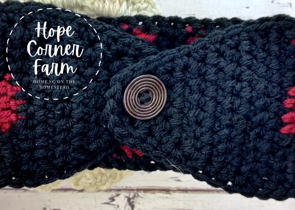 Finished button on the Crochet Buffalo Plaid Flower Headband