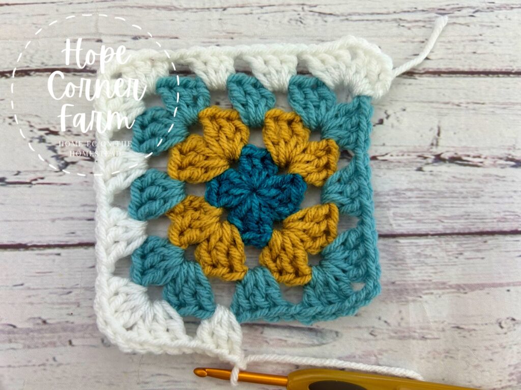 crochet granny square round 4 almost done