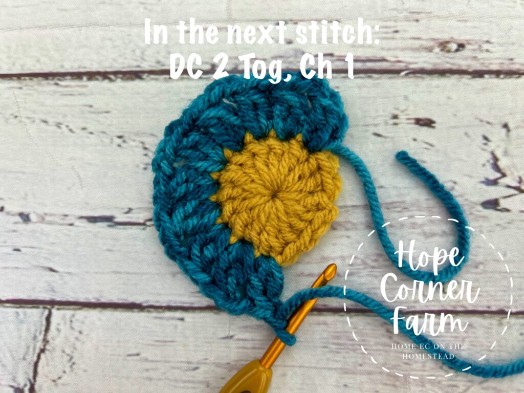DC 2 tog ch 1 for round 2 of the crochet granny square
