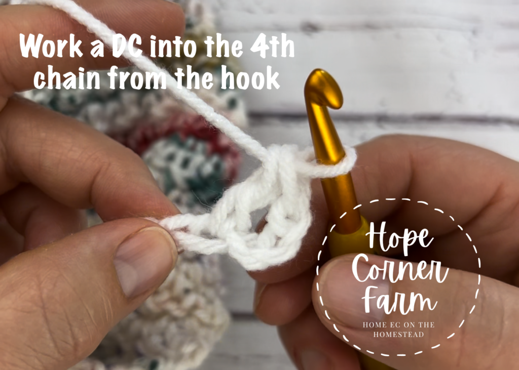 Place a double crochet stitch in the 4th chain from the hook. This starts the crochet blanket border pom pom edge