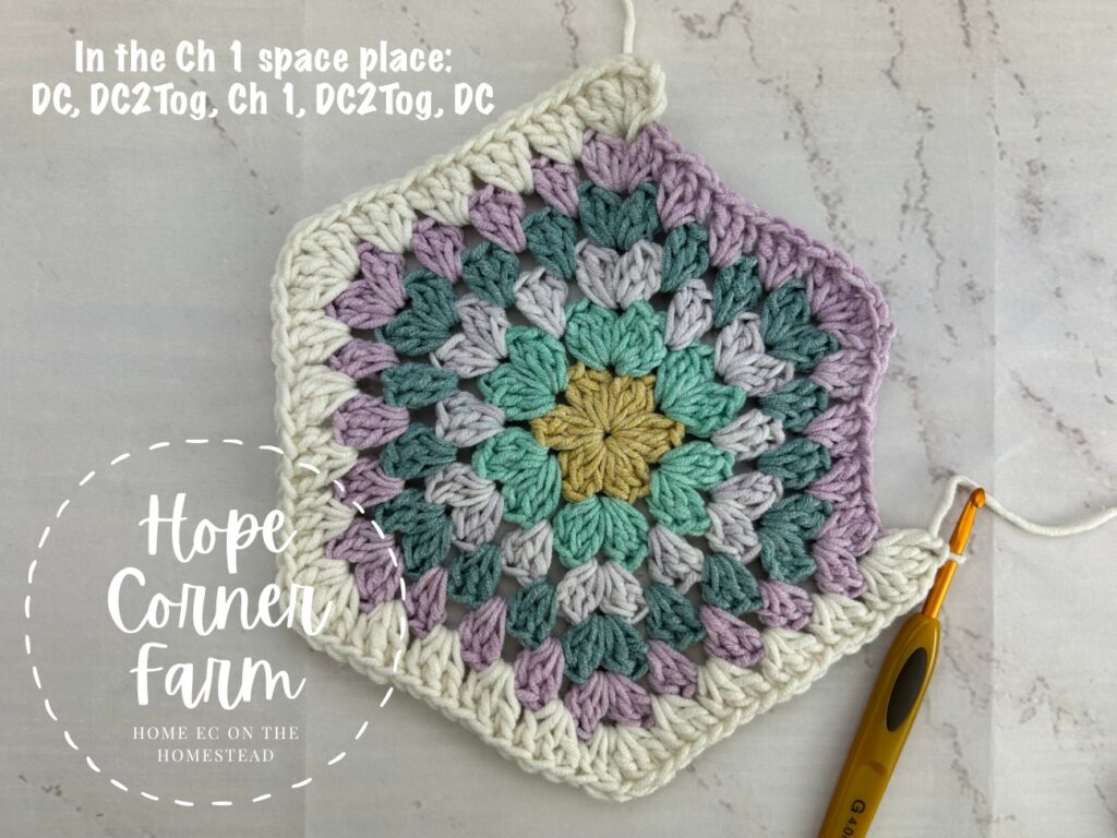 crocheting the 5th corner of the granny hexagon