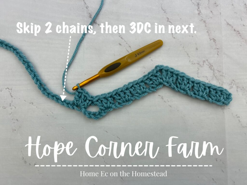 skip 2 chains and then place 3 dc in the next