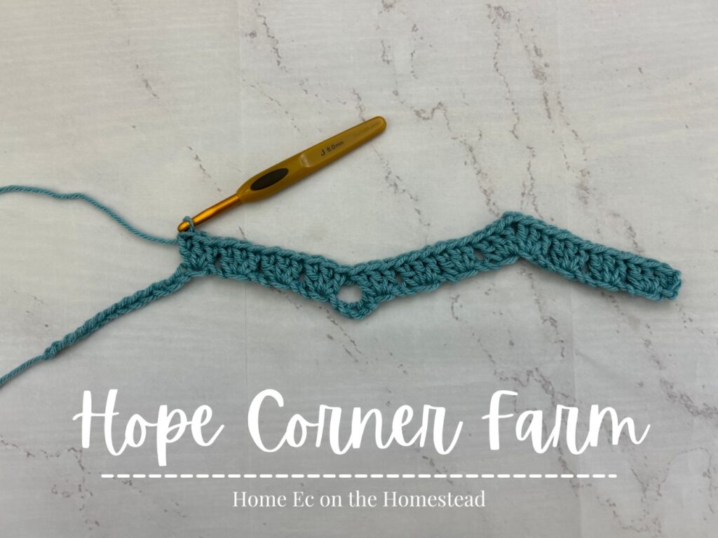 skip 2 chains and then place 3 dc in the next