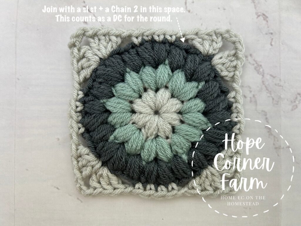 Join with a slip stitch to one of the gaps after a corner