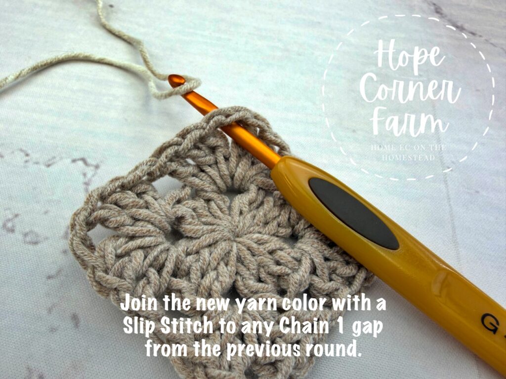 Join the new yarn color with a Slip Stitch to any Chain 1 gap from the previous round.