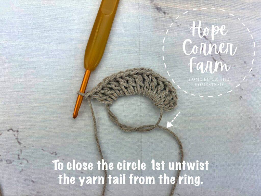 To close the circle, 1st untwist the yarn tail from the ring