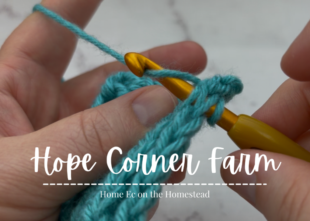 Yarn Over and pull through all 3 loops of yarn on the crochet hook
